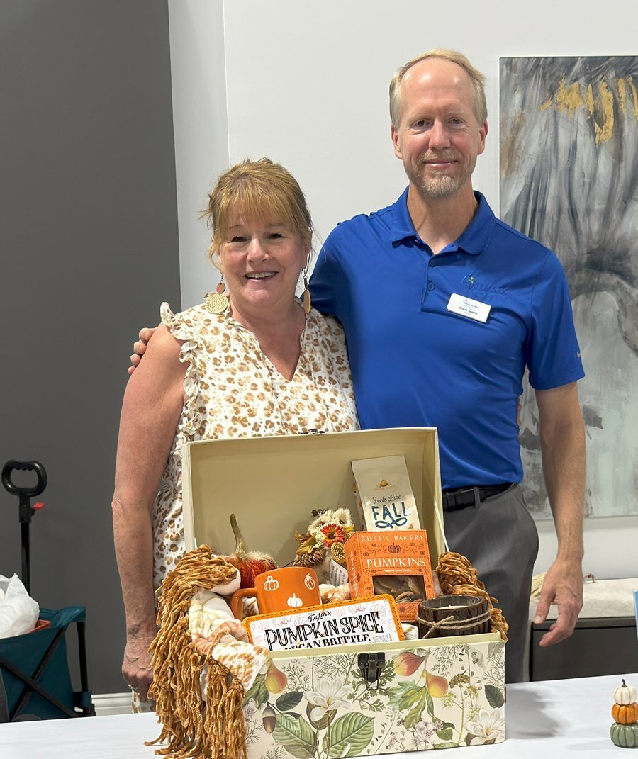 Shane Sparks and Tammy Kaninberg of Hallmark Homecare Louisville at a community event