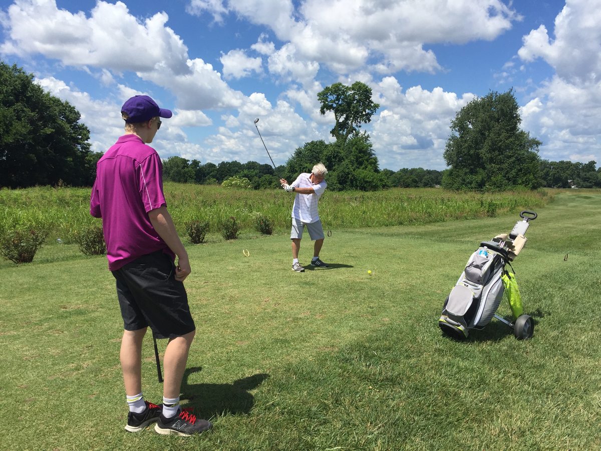 Shane out on the golf course with family