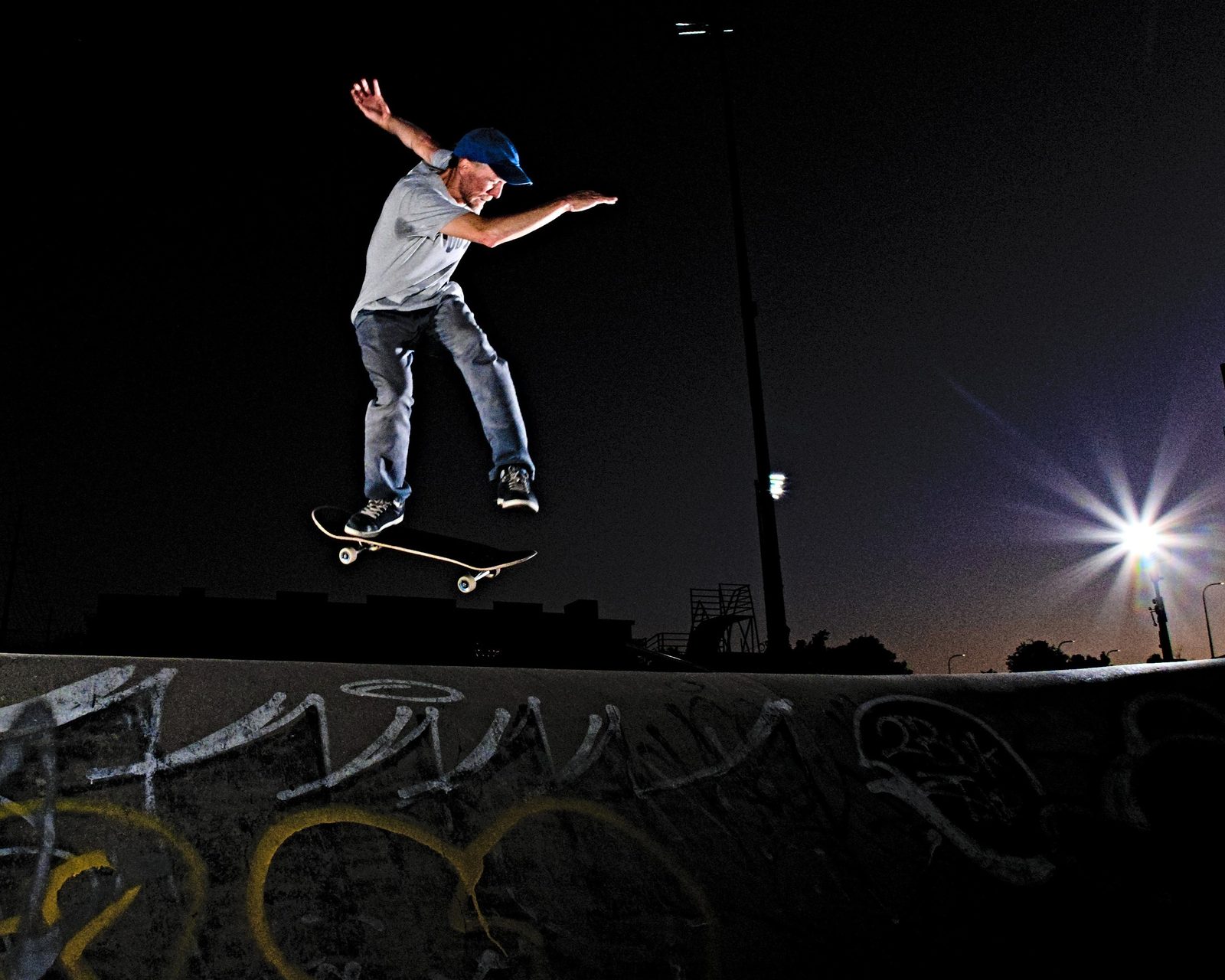 Shane skating under the lights at night